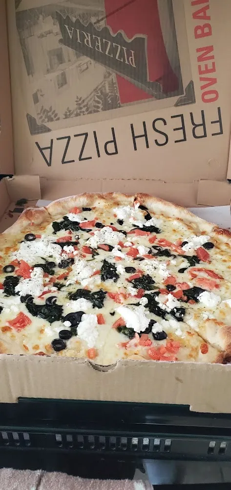 White Pie with Ricotta Spinach and Tomato Olives